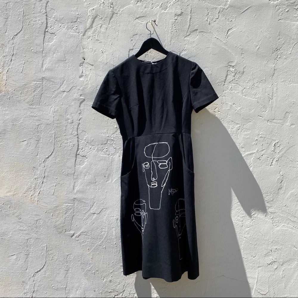 Vintage fitted black nurse’s dress